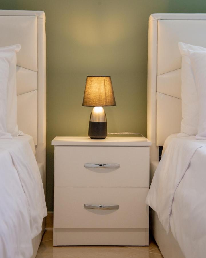 קורצ'ה Ajilin Hotel Rooms מראה חיצוני תמונה