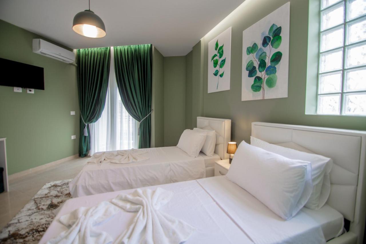 קורצ'ה Ajilin Hotel Rooms מראה חיצוני תמונה